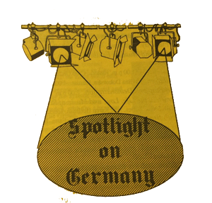Vintage-style illustration of a stage spotlight labeled “Spotlight on Germany,” with a row of hanging lights above.