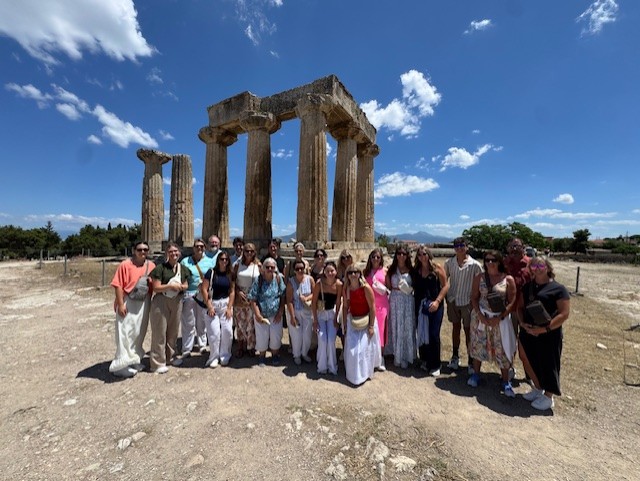 Southwest Community standing in front of a ruin in Greece