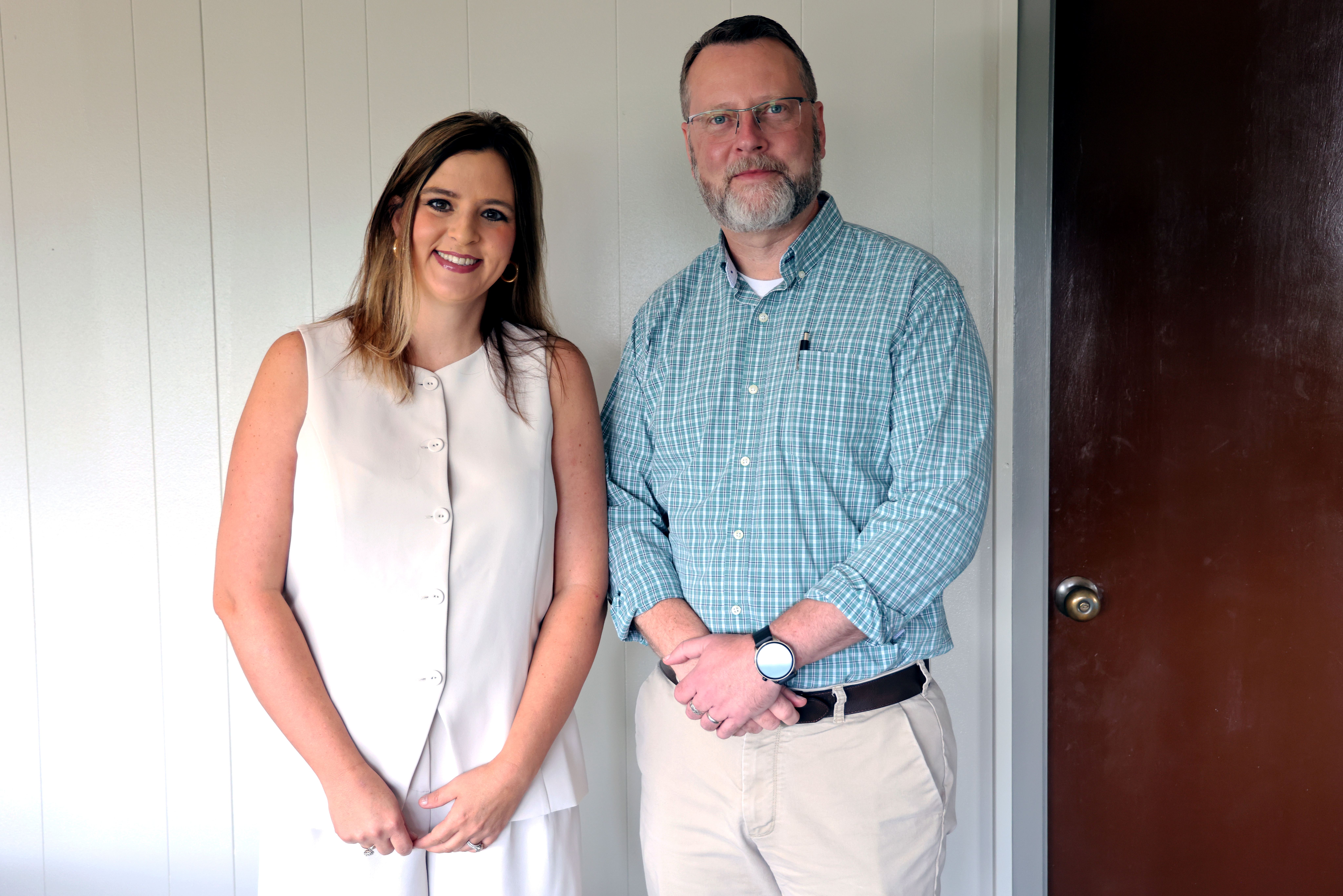 Dr. Hayes and Rachel Patton standing.