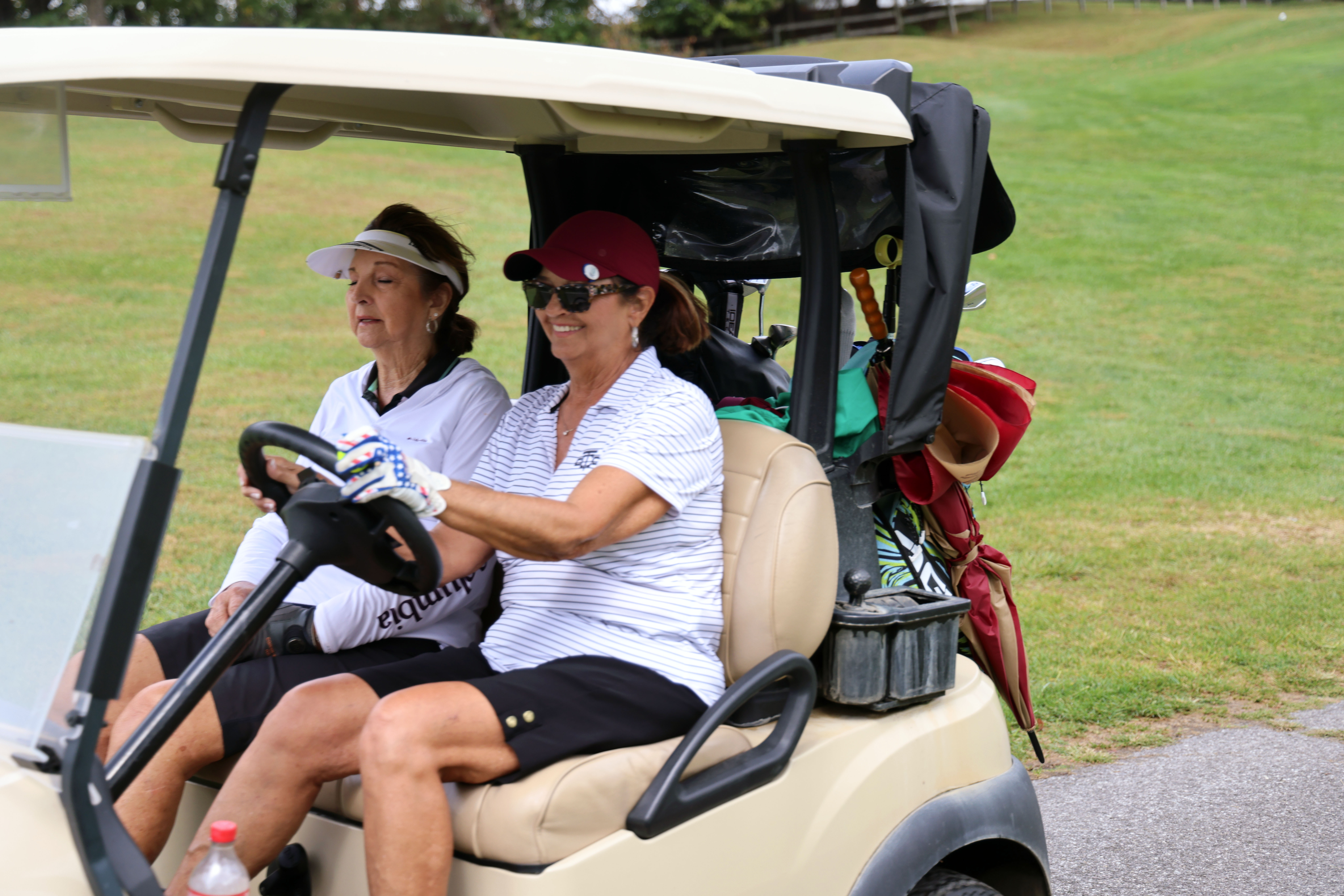 Golf Players on Golf Kart