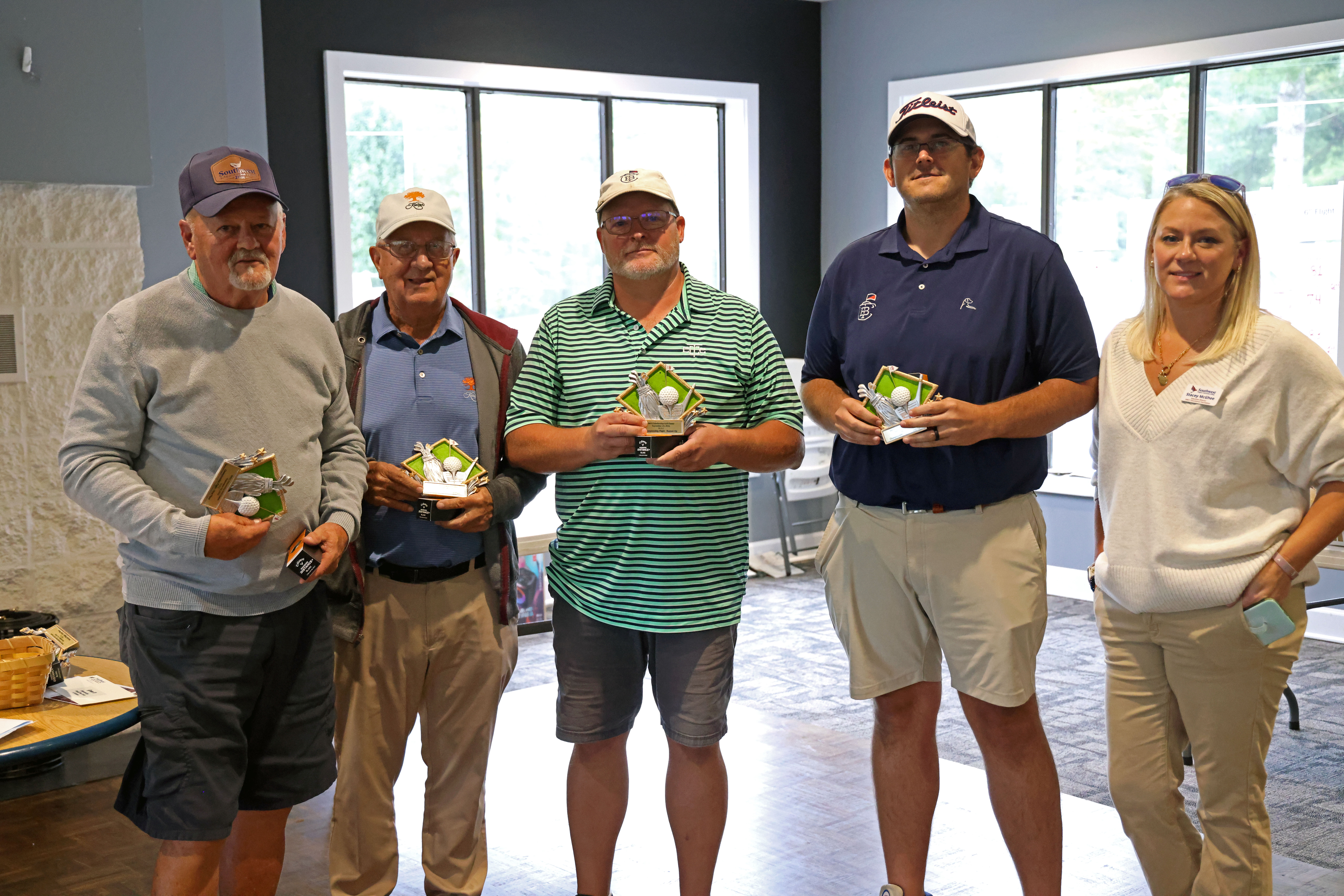 Picture of the Championship Flight Winners and Runner Ups alongside Stacey McGhee