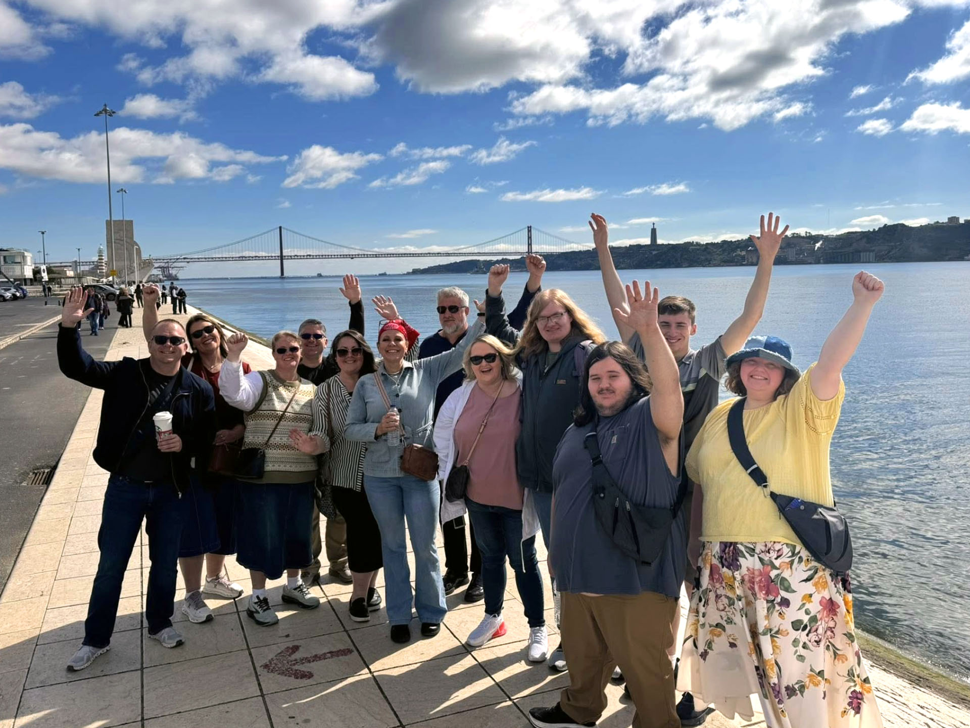 Group Photo of the International Honors Trip in front of waterfront